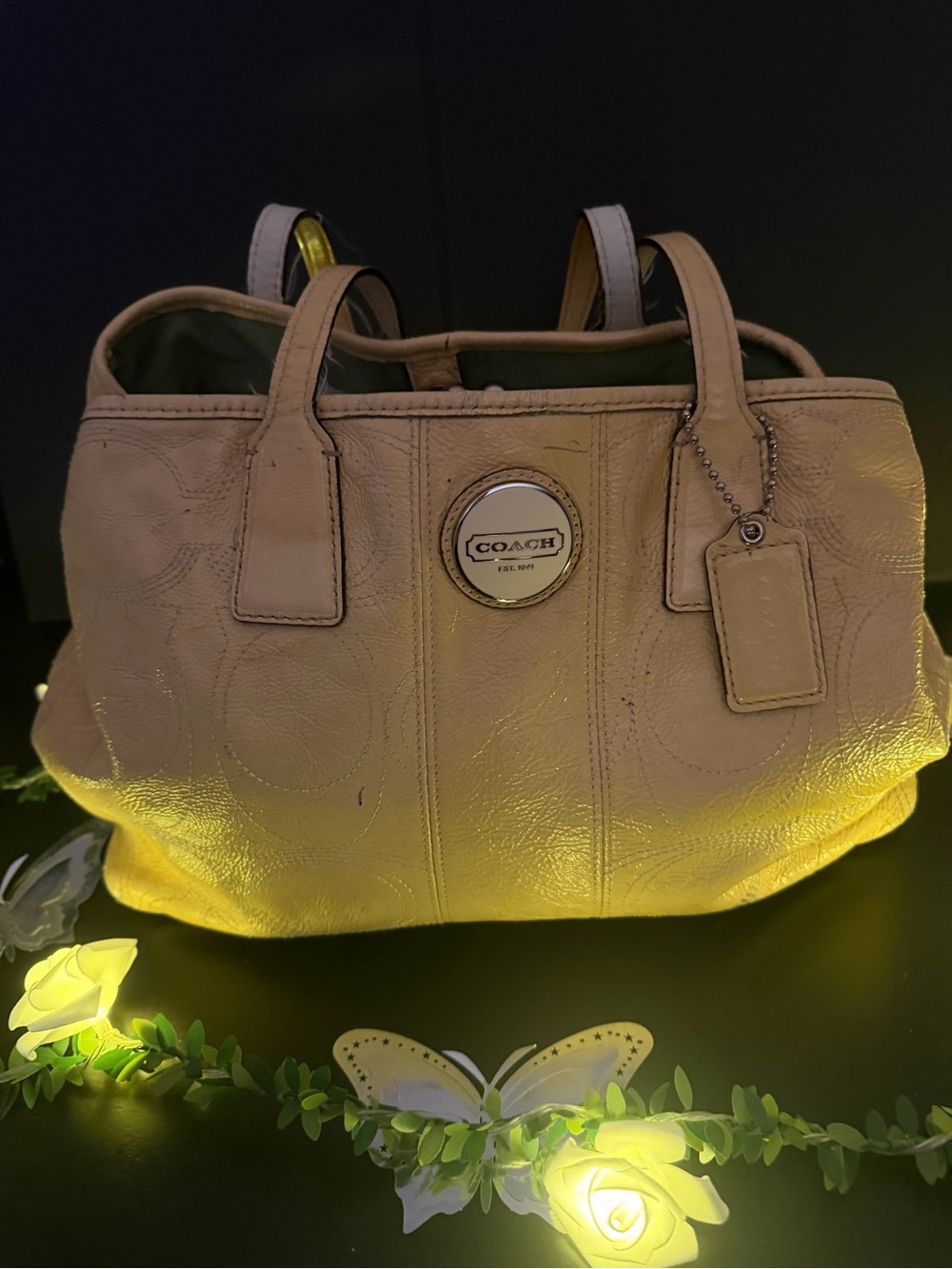 Coach Light Beige Leather kiss lock handbag with Signature Emblem